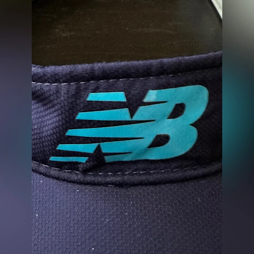 2 New Balance navy blue visors